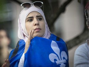 A young protester takes part in rally to denounce the adoption of Bill 21. The rally occurred outside Quebec Premier François Legault's downtown Montreal office on Monday June 17, 2019.