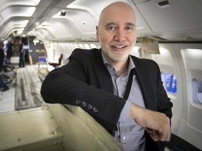 Nolinor vice-president Marco Prud'homme inside one of the company's planes undergoing maintenance in Mirabel.