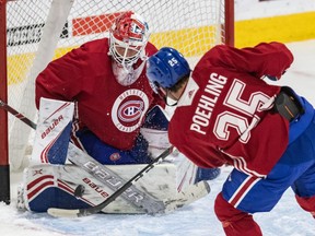 Goaltender Cayden Primeau stops a shot from Ryan Poehling during the Montreal Canadiens' rookie camp at the Bell Sports Complexe in Brossard on Friday, Sept. 6, 2019.