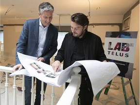 Francois Gratton, left, who runs Telus Quebec, and Zú general manager Guillaume Thérien look a the progress at the site of the new 5G Telus lab on Tuesday. The downtown facility will welcome its first participants by the end of the year, says Thérien.