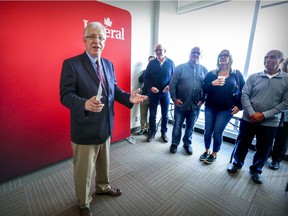 Liberal candidate Francis Scarpaleggia opens his 2019 campaign headquarters in Pointe-Claire, Sunday.