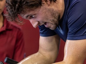 Canadiens newcomer Ben Chiarot works up a sweat on the stationary bike during fitness testing at the Bell Sports Complex in Brossard on Thursday.