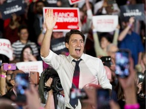 Justin Trudeau arrives for his first election campaign stop in Edmonton, Thursday Sept. 12.