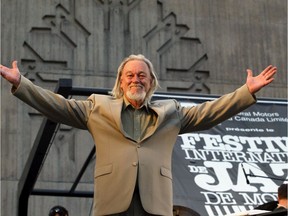 Vic Vogel welcomes the crowd to his 25th annual Montreal International Jazz Festival appearance in 2004 at Place des Nations, the same venue where Vogel did his first jazz fest show in 1980.