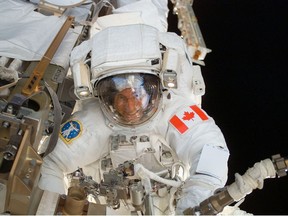 Astronaut Dave Williams executes his second of three space walks during his stay on the International Space Station. The photo was taken Aug. 13, 2007.