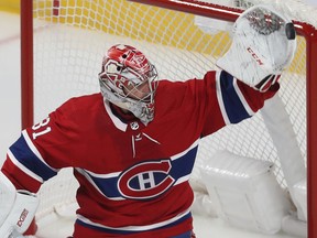 Montreal Canadiens goaltender Carey Price deflects shot from Florida Panthers player during NHL exhibition game in Montreal on Sept. 19, 2019.