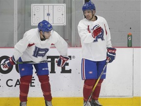 Alex Belzile, right, and Maxim Lamarche during  Laval Rocket training camp practice on Wednesday, Sept. 25, 2019.