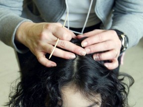 Lice checks are a normal part of the school year.