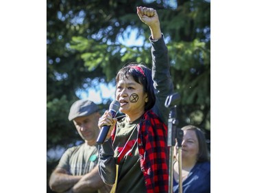Mei Chui of Extinction Rebellion climate activist group speaks during a climate press conference prior to the march in Montreal on Friday, Sept. 27, 2019.