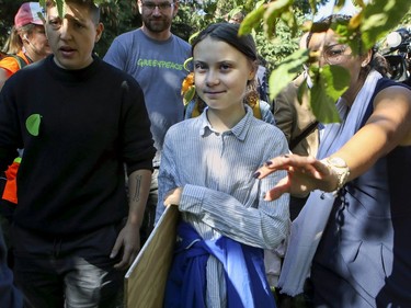 Greta Thunberg leaves a press conference prior to climate march in Montreal on Friday, Sept. 27, 2019.