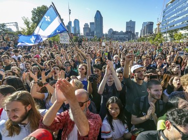 Protesters cheer Swedish climate activist Greta Thunberg during her speech at the end of the climate march in Montreal on Friday, Sept. 27, 2019.