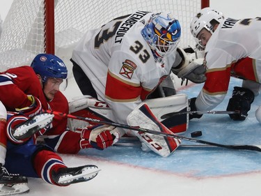 Montreal Canadiens Artturi Lehkonen (62) tries to reach for puck near Florida Panthers goaltender Sam Montembeault and Keith Yandle (3) during third period NHL exhibition game in Montreal on Thursday September 19, 2019.