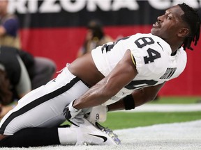 Wide receiver Antonio Brown of the Oakland Raiders warms up before the NFL preseason game against the Arizona Cardinals at State Farm Stadium on August 15, 2019, in Glendale.