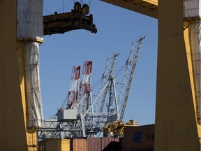 Container cranes remain idle in the Port of Montreal in 2019.