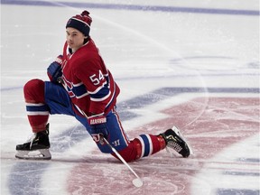 Canadiens winger Charles Hudon takes a break during a skills competition in Montreal on Jan. 20, 2019.