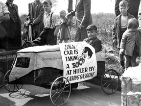 One of the entries in the fourth annual Kinsmen Coaster Classic soapbox derby, held on Van Horne Ave. in Montreal on Sept. 20, 1941, reflects a wartime influence. The sign reads: "This car is taking a sock at Hitler by saving gasoline."