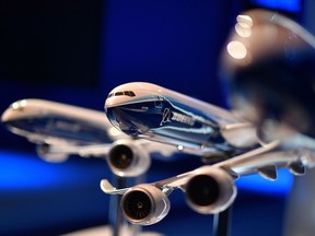 A model of a Boeing 777X is displayed during the Farnborough Airshow, south west of London, on July 17, 2018.