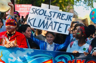 Greta Thunberg joins Indigenous youth at the head of the big climate march in Montreal on Friday, Sept. 27, 2019.