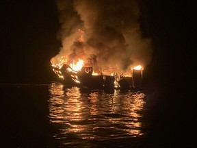 A boat burns off the coast of Santa Cruz Island, California. - Rescuers were scrambling Monday to reach more than 30 people who were sleeping below deck when their scuba-diving boat caught fire off the California coast, with reports of "numerous fatalities." A major rescue operation was underway for the dozens of people trapped aboard the 75-foot (22-meter) boat, near Santa Cruz Island off the coast from Los Angeles, the Coast Guard tweeted.