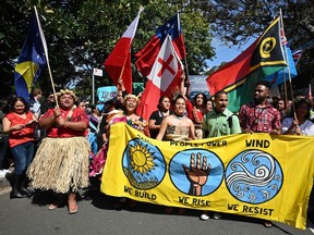 Pacific Islanders attend a protest march as part of the worlds largest climate strike in Sydney on September 20, 2019.