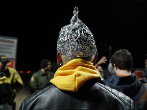 Attendee Daniel Rodriguez wears at tinfoil hat as he and other Alien hunters gathered to "storm" Area 51 at an entrance near Rachel, Nevada on September 20, 2019. - Alien-hunters are arriving near Area 51 after a viral craze that saw them commit to storm the mysterious US military base as a variety of events are taking place to mark the weekend, including music festivals in a variety of locations.