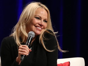 Pamela Anderson takes part in a question and answer session at the Calgary Expo on Sunday April 28, 2019.
