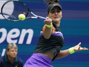 Bianca Andreescu of Canada returns a shot against Serena Williams of the U.S. during the Women's Singles Finals match at the 2019 U.S. Open at the USTA Billie Jean King National Tennis Center in New York on Saturday, Sept. 7, 2019.