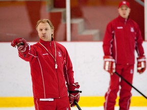 McGill hockey coach Kelly Nobes gives instructions to players during practice at McConnell Arena on Jan. 12, 2011.