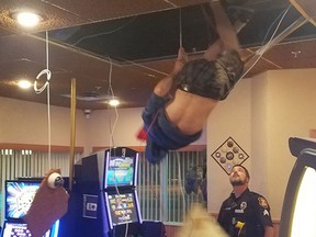 A man fell through a casino ceiling while trying to escape police.
