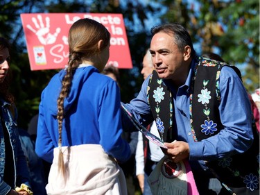 Assembly of First Nations National Chief Perry Bellegarde presents a gift to climate change teen activist Greta Thunberg in Montreal, Quebec, Canada September 27, 2019.