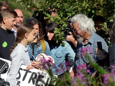 MONTREAL, CANADA: David Suzuki meets with climate change teen activist Greta Thunberg before joining a climate strike march in Montreal, Sept. 27, 2019.