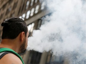 A man uses a vape in this file photo.