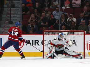 The Canadiens' Nick Suzuki scores shootout goal with a nifty move against Florida Panthers goalie Sam Montembeault during NHL preseason game at the Bell Centre in Montreal on Sept. 19, 2019.