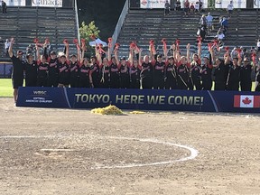 Team Canada celebrating qualifying for the Tokyo 2020 Summer Olympics on Sunday at Softball City.