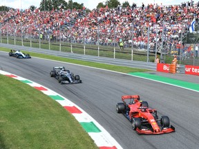 Ferrari's Charles Leclerc and Mercedes' Lewis Hamilton in action during the race   REUTERS/Jennifer Lorenzini