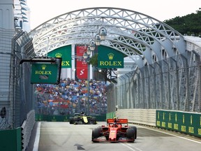 Ferrari's Charles Leclerc drives during practice. at the Marina Bay Street Circuit in Singapore on Saturday, Sept. 21, 2019.