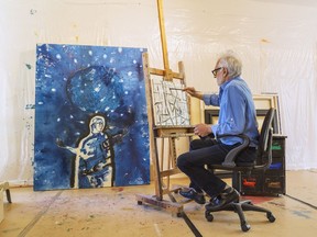 The internationally renowned Armenian-born Canadian painter and sculptor Garen Bedrossian at work in his Montreal home studio.