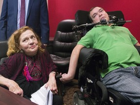 Nicole Gladu, left, and Jean Truchon attend a news conference in Montreal on Thursday, Sept. 12, 2019.