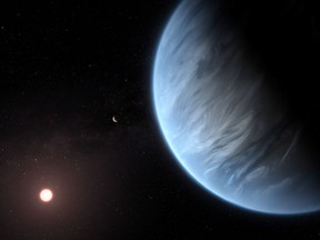 An artist's impression released by NASA on September 11, 2019 shows the planet K2-18b, its host star and an accompanying planet.