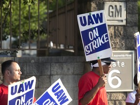 Members of the United Auto Workers union protest outside the General Motors Arlington Assembly Plant on Sept. 16, 2019, in Arlington, Tex.