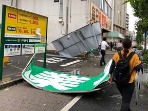 Collapsed steel advertising boards caused by Typhoon Faxai are seen at Edgawa ward in Tokyo, Japan, on Monday, Sept. 9, 2019.