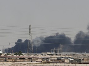 Smoke is seen following a fire at Aramco facility in the eastern city of Abqaiq, Saudi Arabia, on Saturday, Sept. 14, 2019.