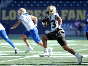 Andrew Harris gallops down the field during Winnipeg Blue Bombers practice at IG Field on Tues., Sept. 17, 2019.