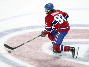 The Canadiens' Jonathan Drouin carries the puck across centre ice at the Bell Centre during NHL game against the Florida Panthers in Montreal on Jan. 15, 2019.