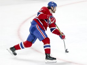 Montreal Canadiens' Jonathan Drouin takes a shot during warmup prior to a game against the  Florida Panthers in Montreal on Jan. 15, 2019.