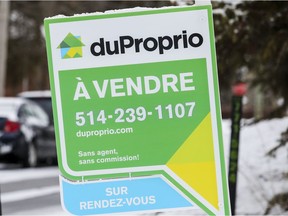 A for sale sign as seen on the lawn of a Lachine property last year.