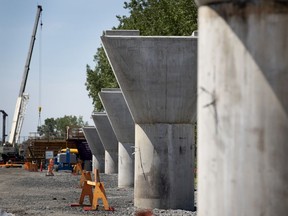 MONTREAL, QUE.: June 18, 2019 -- Concrete pylons wait for the the prefabricated tubular sections that will make up an overpass as seen during a media tour of the REM construction project in Montreal, on Tuesday, June 18, 2019. (Allen McInnis / MONTREAL GAZETTE) ORG XMIT: 62719
