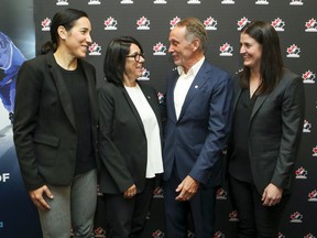 From left, Caroline Ouellette, assistant women's hockey coach at Concordia University and Women's Hockey Canada, Danièle Sauvageau, Team Canada alumna and general manager of the Université de Montréal women's hockey team, Barry Lorenzetti, president and CEO of BFL Canada, and Gina Kingsbury, Hockey Canada's director of women's national teams, announce partnership between BFL Canada and Hockey Canada.