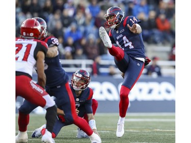 Alouettes kicker Boris Bede and holder Matthew Shiltz watch Bede's field goal split the uprights against the Calgary Stampeders in Montreal on Saturday, Oct. 5, 2019.