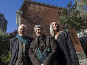 Montreal architect Phyllis Lambert (centre), in front of a mural unveiled in her honour at the corner of Jeanne Mance and Milton Sts., is seen with Dinu Bumbaru of Heritage Montreal (left) and artist Melissa Del Pinto in Montreal on Tuesday, Oct. 8, 2019.